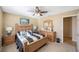 Bedroom with wooden furniture and en-suite bathroom at 4621 Dumont St, New Port Richey, FL 34653