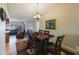 Dining area with dark wood table and leather chairs at 4621 Dumont St, New Port Richey, FL 34653