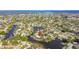 Aerial view highlighting the property's waterfront location and canal access at 4780 Butterfly Ne Pl, St Petersburg, FL 33703