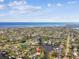 Aerial perspective of the property, emphasizing its waterfront location and surroundings at 4780 Butterfly Ne Pl, St Petersburg, FL 33703