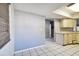 Simple dining area with light gray walls and dark wood floors at 569 Daventry Sq, Palm Harbor, FL 34683