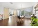 Bright dining area with sliding barn doors and a modern dining table at 6525 Hobson Ne St, St Petersburg, FL 33702