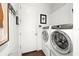 Convenient laundry room with washer, dryer, and extra storage at 6525 Hobson Ne St, St Petersburg, FL 33702