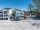 Beachfront home exterior showcasing its unique design and ocean views at 8406 W Gulf Blvd, Treasure Island, FL 33706