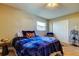 Spacious bedroom with blue bedding and large closet at 9231 79Th Ave, Seminole, FL 33777