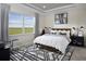 Spacious bedroom with large windows and stylish decor at 11286 Boundless Ter, Venice, FL 34293
