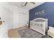 Bedroom featuring a crib, wall decor, and neutral color scheme at 12107 Rustic River Way, Tampa, FL 33635