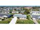 Bird's-eye view of a single-story house in a residential neighborhood at 1507 Belle Glade Ave, Sun City Center, FL 33573