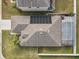 House with pool and solar panels, aerial view at 15403 Fire Rock Pl, Ruskin, FL 33573