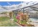 Landscaped backyard with pool and plants at 15403 Fire Rock Pl, Ruskin, FL 33573