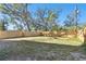 Large backyard area with wooden fence at 1565 13Th S St, St Petersburg, FL 33705