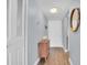 Inviting hallway with wood floors, closet and charming decor at 2060 Marilyn St # 241, Clearwater, FL 33765
