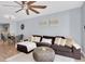 Cozy living room with modern light fixture, stylish furniture, and an open floor plan at 2060 Marilyn St # 241, Clearwater, FL 33765