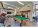 Community recreation room with pool table and kitchenette at 2060 Marilyn St # 241, Clearwater, FL 33765