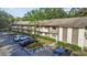 Condo building with ample parking and landscaping at 3034 Eastland Blvd # D108, Clearwater, FL 33761