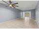 Living room with tile floors and ceiling fan at 3034 Eastland Blvd # D108, Clearwater, FL 33761