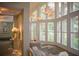 Relaxing lounge with large windows and comfortable seating at 36750 Us Highway 19 N # 01104, Palm Harbor, FL 34684