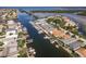 Aerial view of the neighborhood with a marina and tennis courts at 3954 Marine Pkwy, New Port Richey, FL 34652