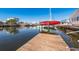 Wooden dock extending into the water, ideal for boat docking at 3954 Marine Pkwy, New Port Richey, FL 34652