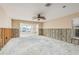 Large living room undergoing renovations; structural framing visible at 3954 Marine Pkwy, New Port Richey, FL 34652
