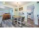 Charming dining area with a round table and built-in cabinetry at 5312 Mary St, Zephyrhills, FL 33542