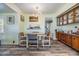 Bright dining area with wood cabinetry and a round table at 5312 Mary St, Zephyrhills, FL 33542