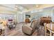 Spacious living room with comfortable seating and large windows at 5312 Mary St, Zephyrhills, FL 33542