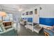 Bright sunroom with seating area and access to the outdoors at 5312 Mary St, Zephyrhills, FL 33542