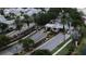 Gated community entrance with palm trees and well-maintained landscaping at 5314 Golden Isles Dr, Apollo Beach, FL 33572