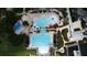 Aerial view of resort-style pool with lap lanes and a waterslide at 5314 Golden Isles Dr, Apollo Beach, FL 33572