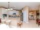 Well-equipped kitchen with white cabinets and granite countertops at 5314 Golden Isles Dr, Apollo Beach, FL 33572