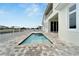 Enjoy this refreshing pool with a spa and water views at 5713 Tybee Island Dr, Apollo Beach, FL 33572