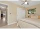 Bright bedroom with ceiling fan and double closet at 807 Monaco Dr, Tampa, FL 33613