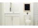 Simple bathroom with white vanity, toilet, and shower at 8427 Bella Mar Trl, Parrish, FL 34219