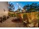 Outdoor patio features string lights, seating, and a dining area at 1002 S Moody Ave # 2, Tampa, FL 33629