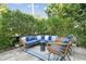 Lush patio with sectional sofa and wicker armchairs at 1002 S Moody Ave # 2, Tampa, FL 33629