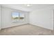 Cozy bedroom with neutral carpet and a scenic view at 10541 Hidden Banks Gln, Parrish, FL 34219