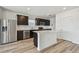 Bright kitchen featuring stainless steel appliances and a center island at 10541 Hidden Banks Gln, Parrish, FL 34219