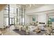 Elegant community lobby with comfortable seating and fireplace at 11275 Boundless Ter, Venice, FL 34293