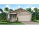 One-story home with tan siding, teal door, and two-car garage at 12260 Meditation Trl, Venice, FL 34293