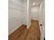 Walk-in closet with shelving offers ample storage space for clothes and accessories at 13400 Haflinger Way, Hudson, FL 34667