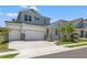 Two-story home with two-car garage and attractive landscaping at 1532 Gopher Loop, Tarpon Springs, FL 34689