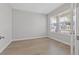 Bright office space with hardwood floors and large window at 1532 Gopher Loop, Tarpon Springs, FL 34689