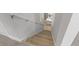 Modern staircase leading to the upper level at 1532 Gopher Loop, Tarpon Springs, FL 34689