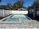 Relaxing backyard oasis featuring a large pool and spa at 1533 Rolling Meadow Dr, Valrico, FL 33594