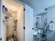 Laundry closet with shelving and washer/dryer hookups at 162 S Saint Thomas Cir, Apollo Beach, FL 33572