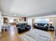 Open concept living and kitchen with hardwood floors at 162 S Saint Thomas Cir, Apollo Beach, FL 33572