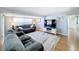 Spacious living room with hardwood floors and comfy sofas at 162 S Saint Thomas Cir, Apollo Beach, FL 33572