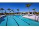 Lap pool with a relaxing pool area and lounge chairs at 17778 Solstice Ave, Venice, FL 34293