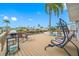 Waterfront deck with seating, grill, and stunning canal views at 18675 Us Highway 19 N # 319, Clearwater, FL 33764